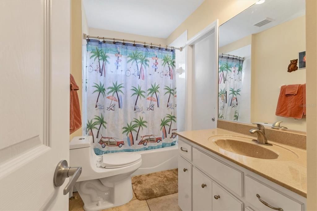 Guest Bath with door out to lanai