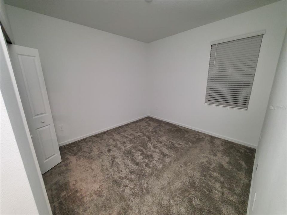 Bedroom # is carpeted and measures 11 x 11