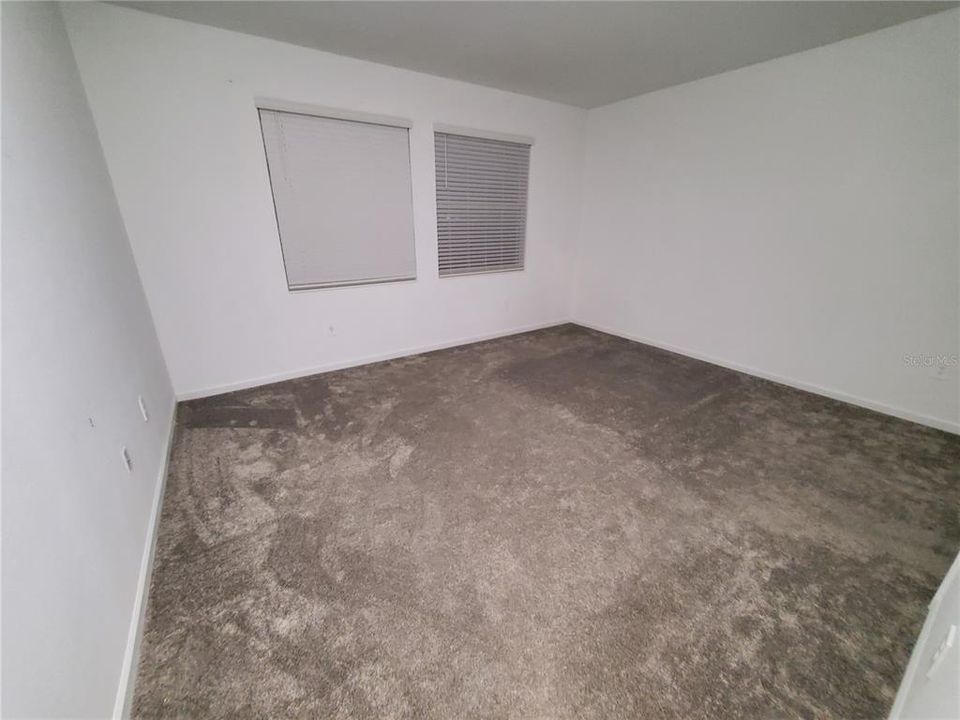 Master Bedroom is  carpeted and measures 16 x 13