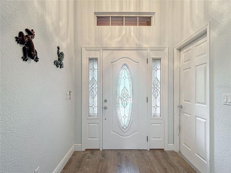 Spacious entry foyer with lots of natural light.