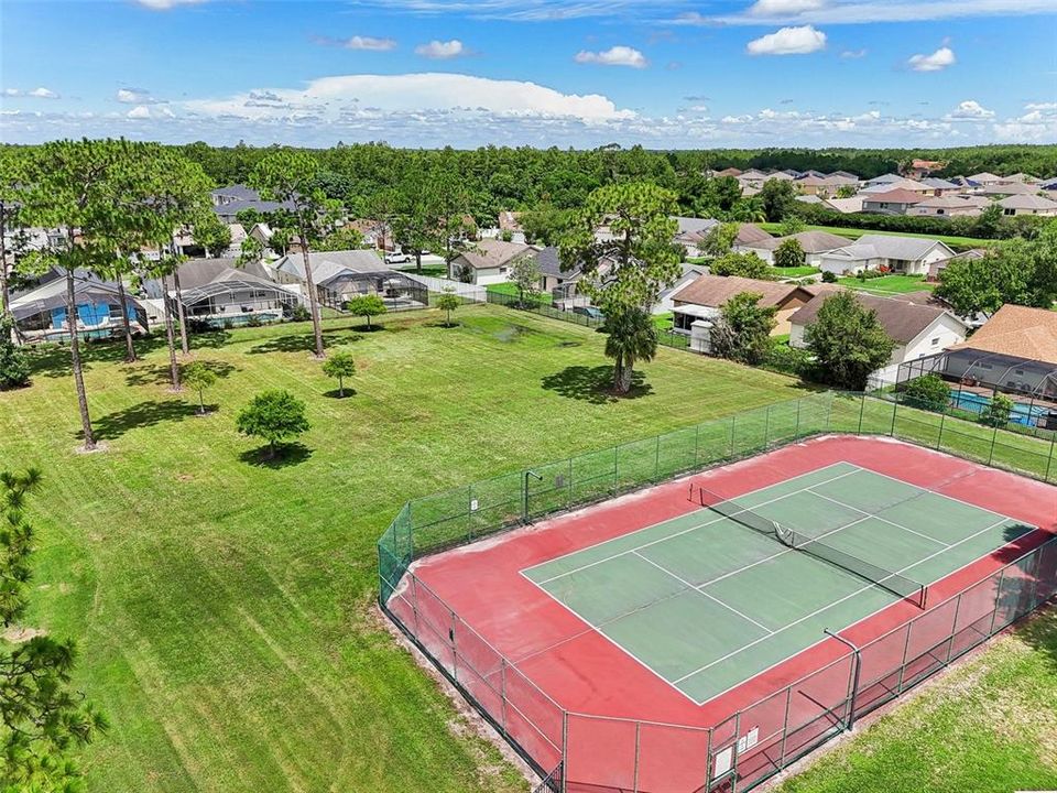 RESORT STYLE AMENITIES that include: a LARGE COMMUNITY POOL that OVERLOOKS an OVERSIZED POND, a WELL MAINTAINED REGULATION SIZE TENNIS COURT, a LARGE PLAYGROUND for ALL YOUTH AGES, an OPEN RECREATIONAL FIELD, PICNIC TABLES and STONE STATUES and a PLAQUE COMMERATING our UNITED STATES ARMED FORCES!