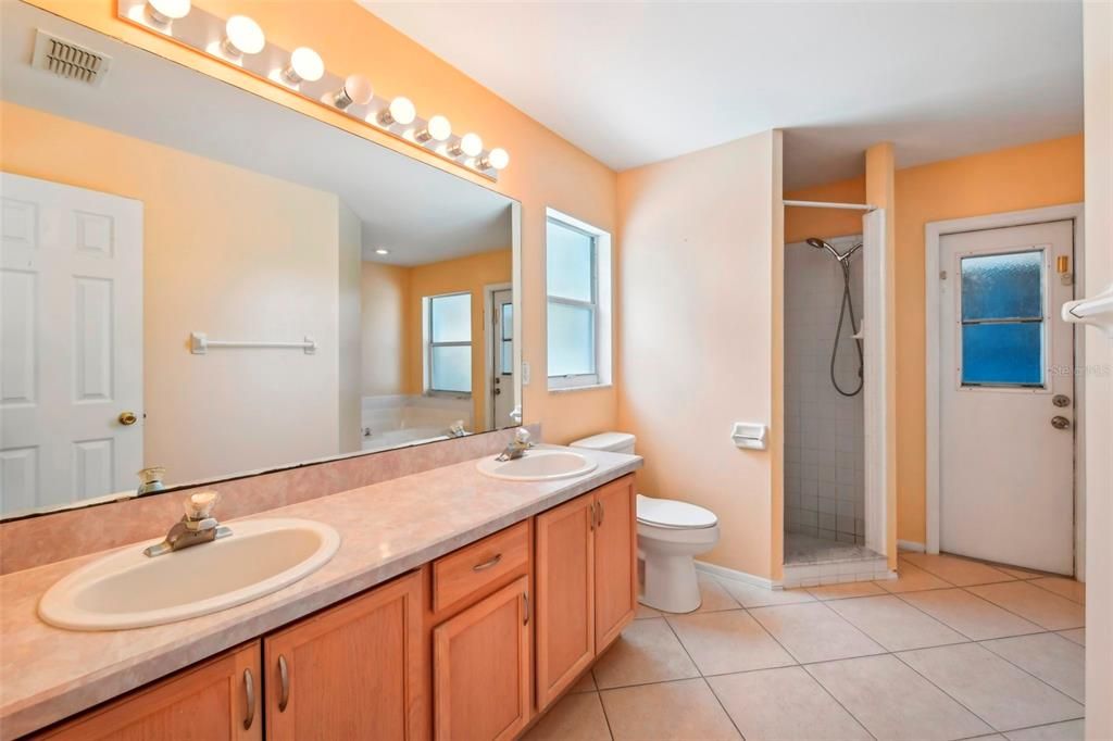 Primary Bathroom with Dual Vanity, Tub and Separate Shower