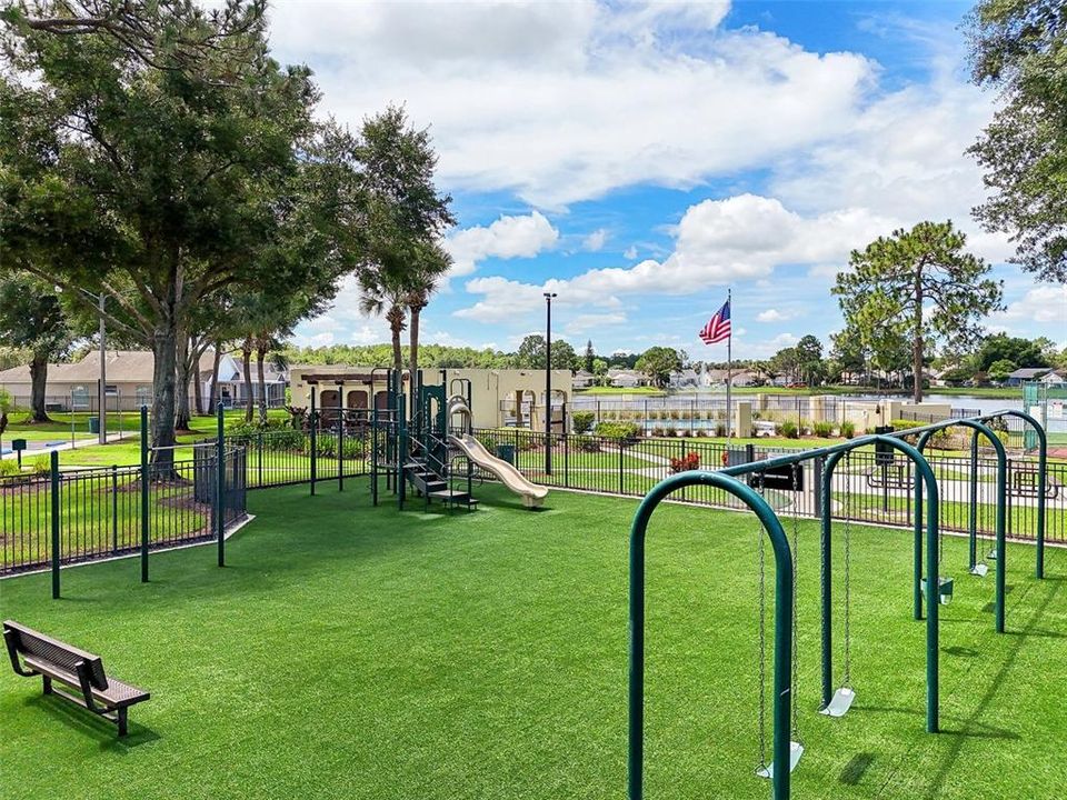 RESORT STYLE AMENITIES that include: a LARGE COMMUNITY POOL that OVERLOOKS an OVERSIZED POND, a WELL MAINTAINED REGULATION SIZE TENNIS COURT, a LARGE PLAYGROUND for ALL YOUTH AGES, an OPEN RECREATIONAL FIELD, PICNIC TABLES and STONE STATUES and a PLAQUE COMMERATING our UNITED STATES ARMED FORCES!