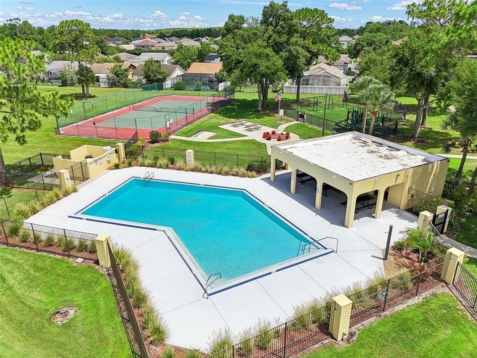 RESORT STYLE AMENITIES that include: a LARGE COMMUNITY POOL that OVERLOOKS an OVERSIZED POND, a WELL MAINTAINED REGULATION SIZE TENNIS COURT, a LARGE PLAYGROUND for ALL YOUTH AGES, an OPEN RECREATIONAL FIELD, PICNIC TABLES and STONE STATUES and a PLAQUE COMMERATING our UNITED STATES ARMED FORCES!