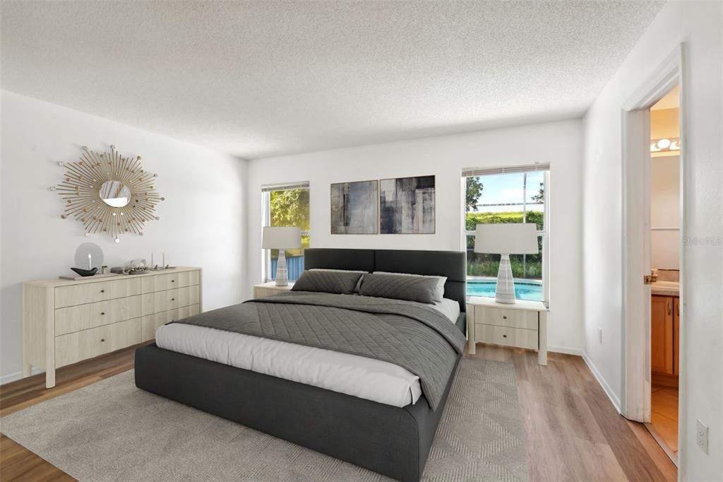 Primary Bedroom with direct view of Pool