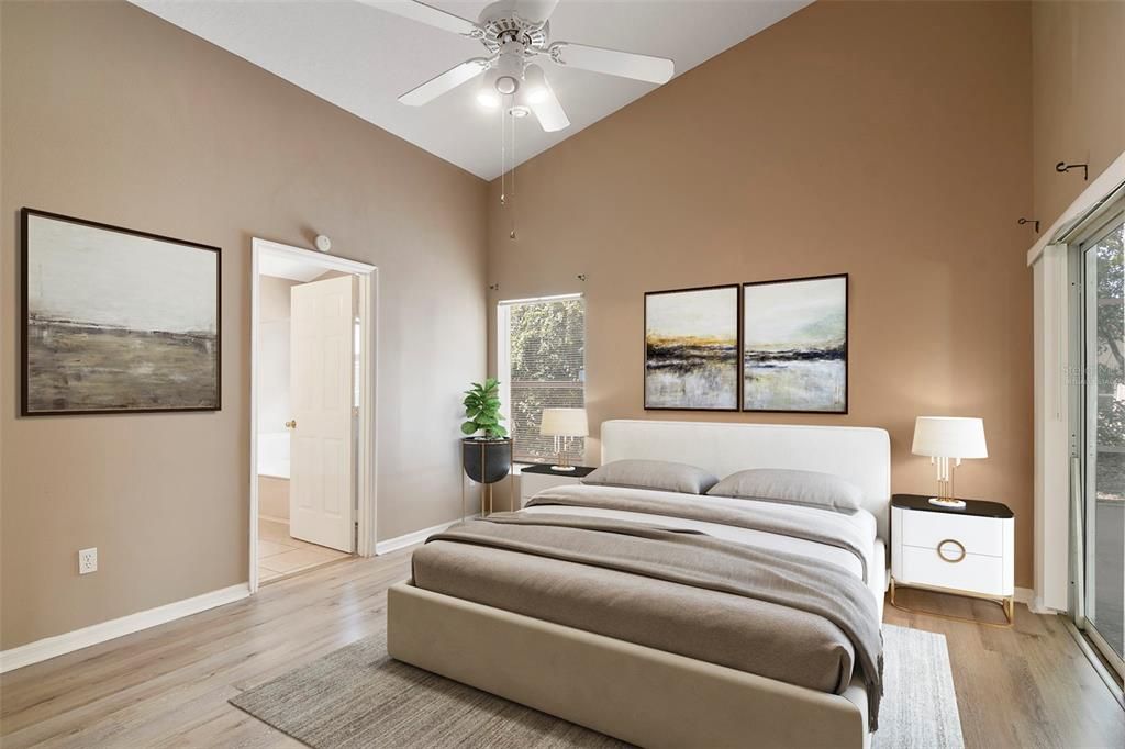 The vaulted ceilings continue in the PRIMARY SUITE where the owner will enjoy direct access to the lanai, a WALK-IN CLOSET and private en-suite bath. Virtually Staged.