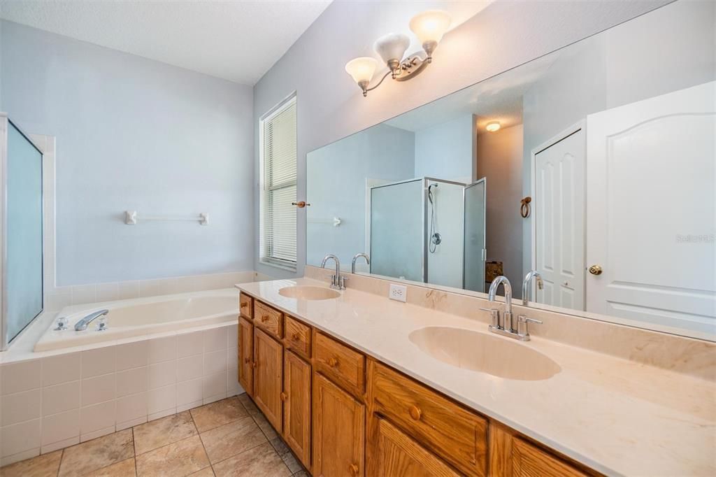 Master Bathroom, double vanities, separate tub and shower.