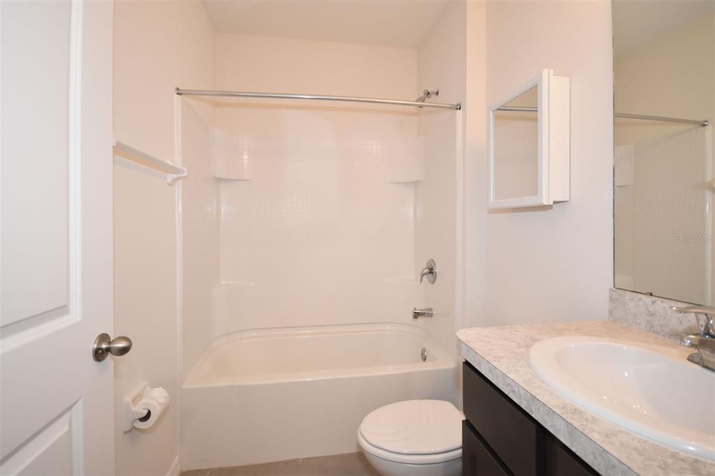 Guest Bath has tub/shower combo