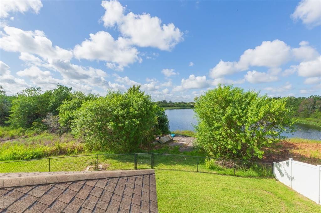 pond view from primary bedroom