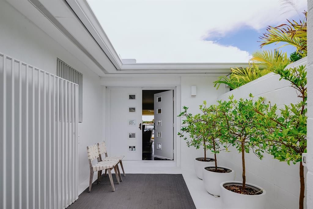 Modern double entry doors with locking gate.