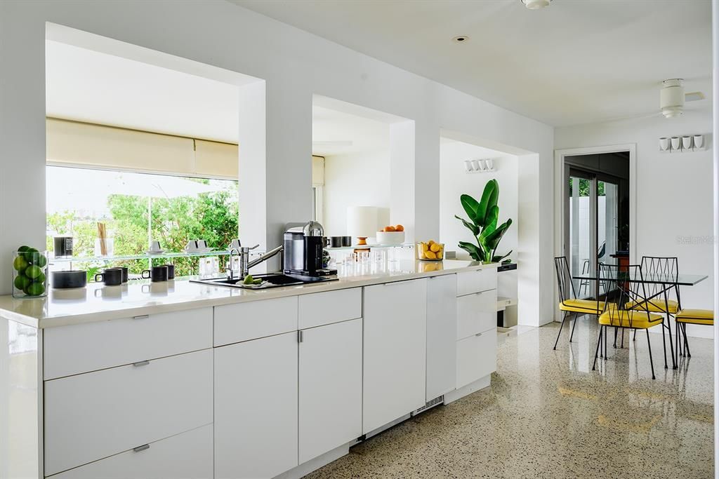 Kitchen view to Florida Room and water.