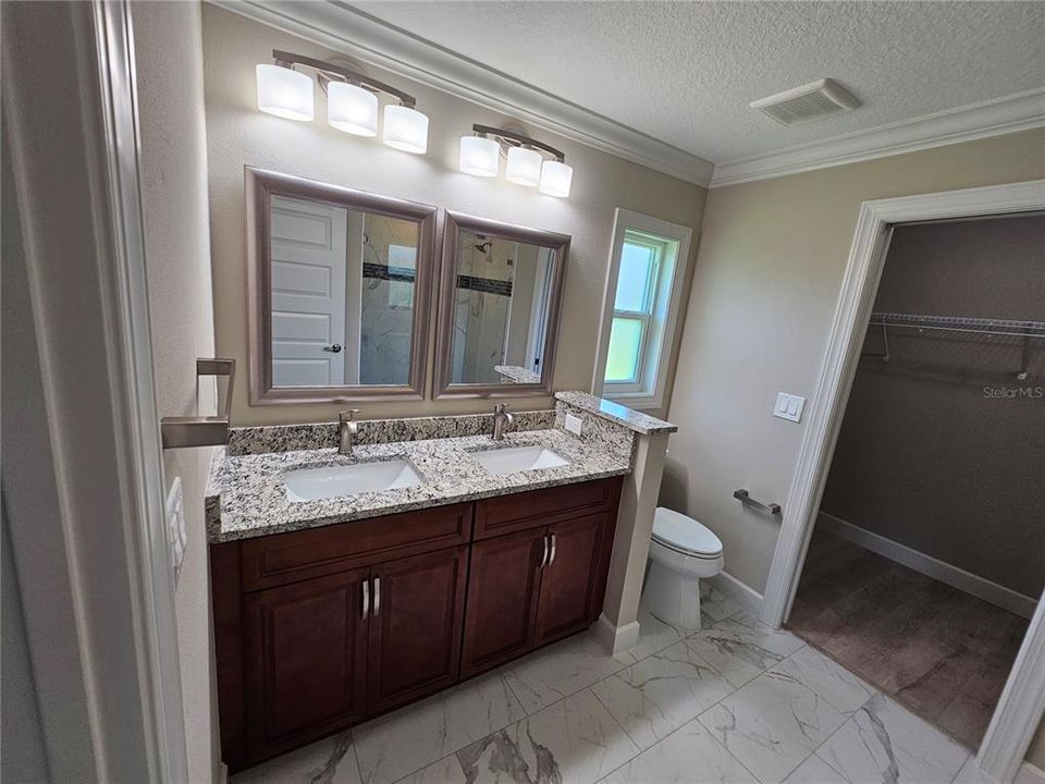 Primary Bathroom with double sing vanity