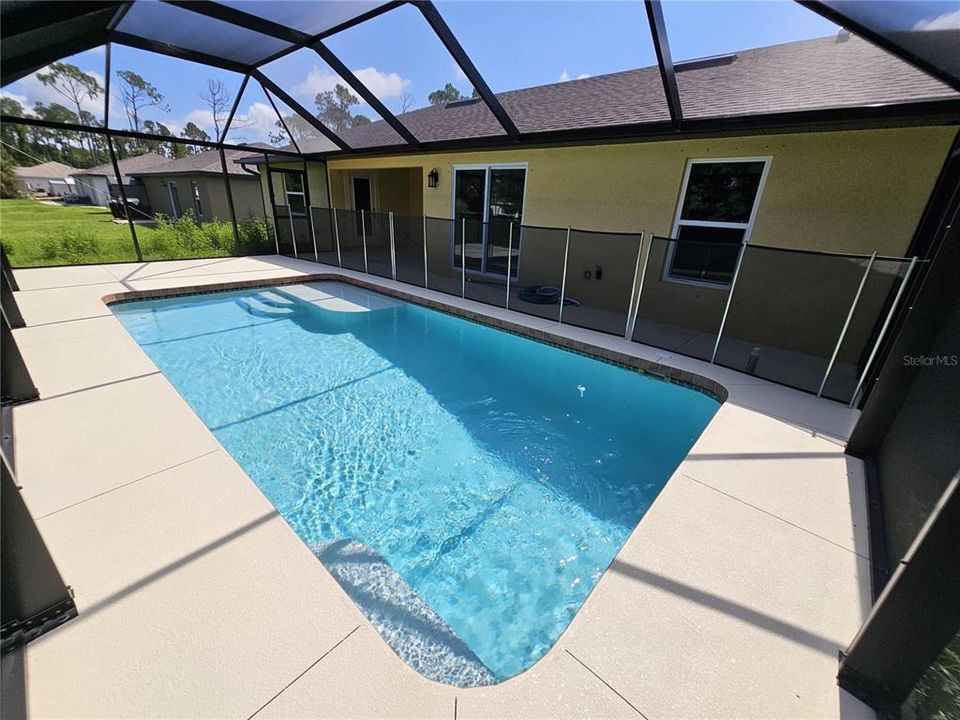 Saltwater pool with child safety net