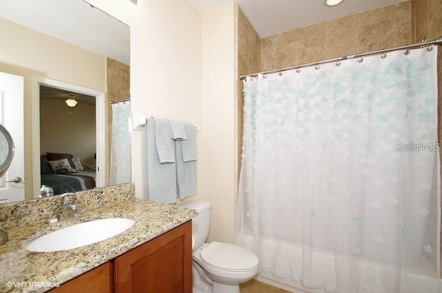 Secondary bath.  Note granite and undercount sink.