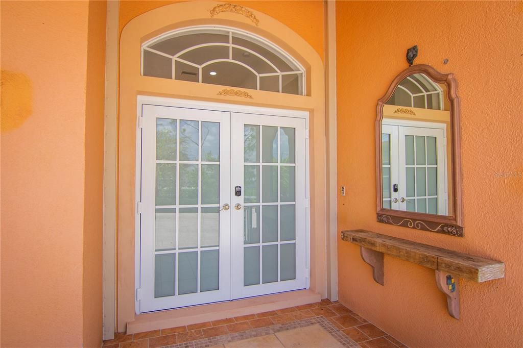 Main entrance of the house with French doors.