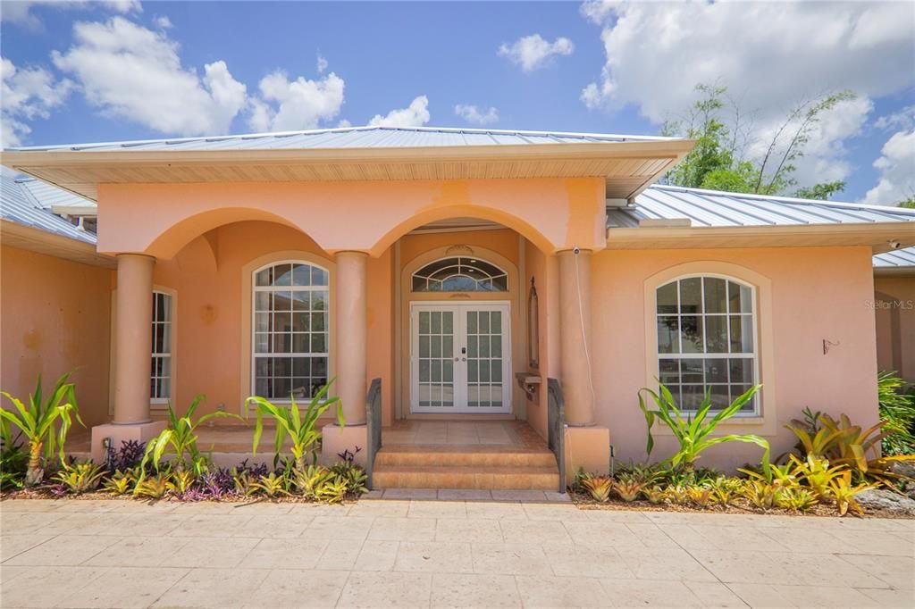 Front of the house with Florida-friendly landscaping.