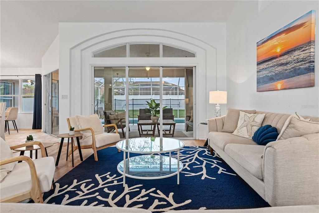 Custom Designed Living Room with view of the pool