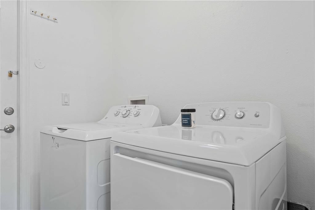 Laundry room complete with Washer and Dryer