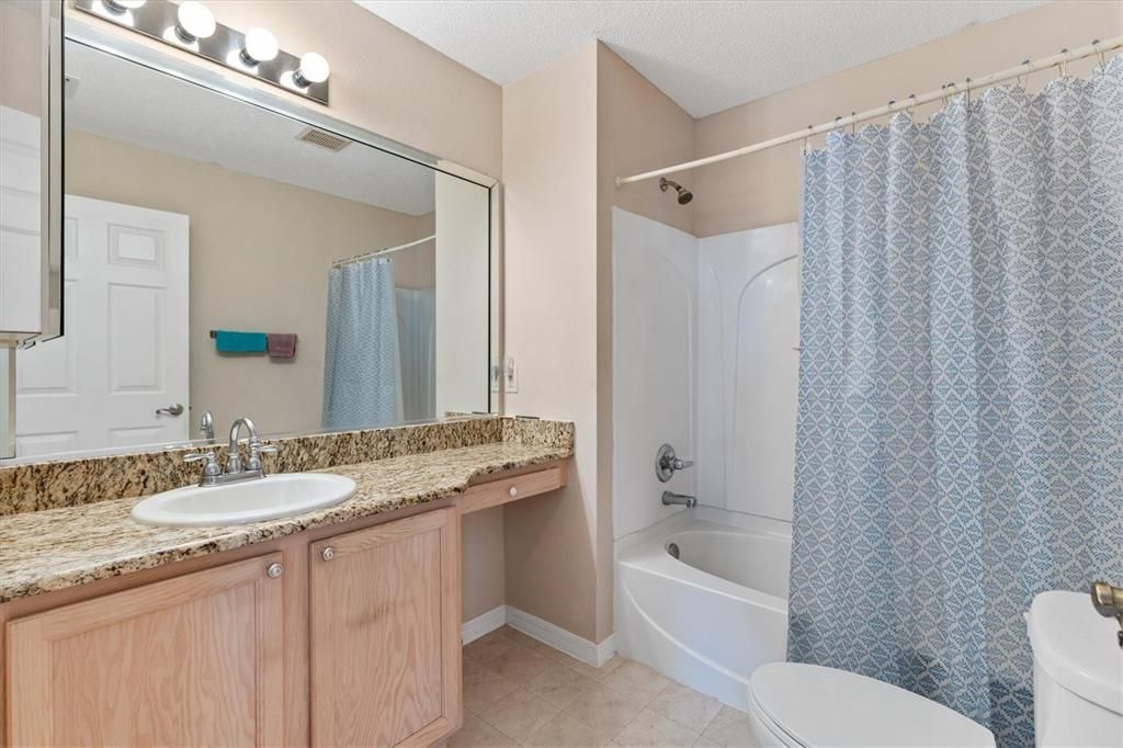 Guest Bathroom With Extended Counter And Tub/Shower Combination