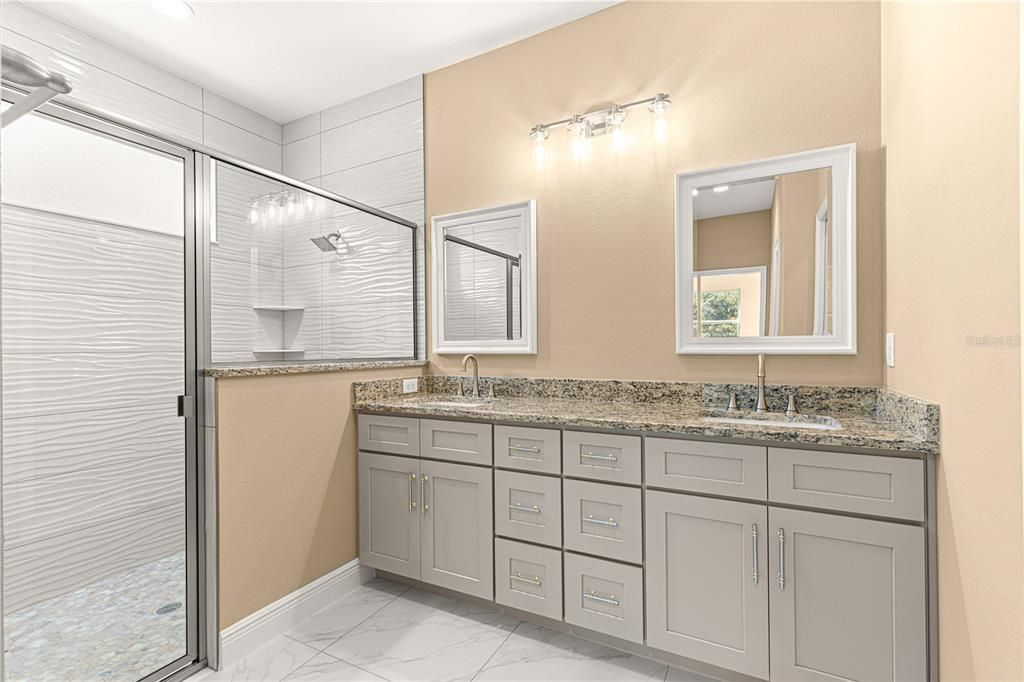 PRIMARY SUITE FULL BATHROOM DUAL SINKS AND LARGE WALK-IN SHOWER