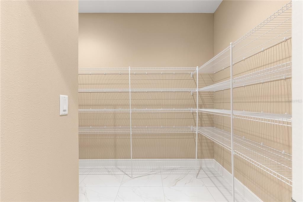 OVERSIZED WALK-IN PANTRY- LOCATED IN MUDROOM