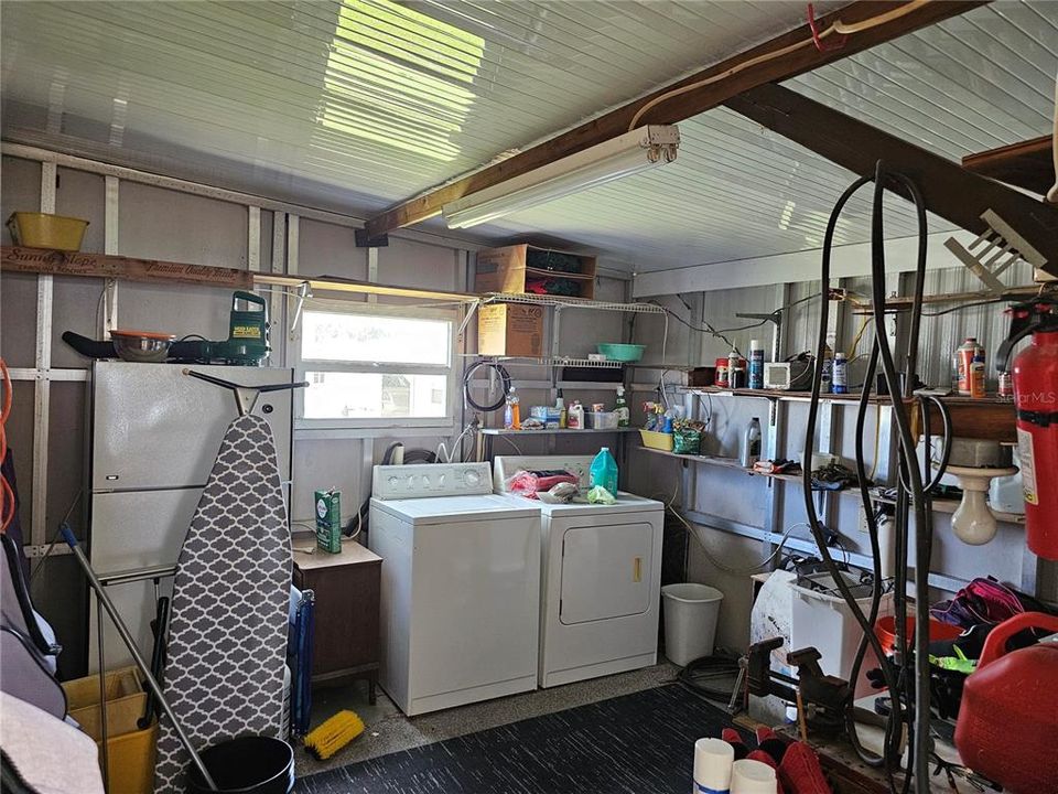 Utility room Halls washer and dryer and plenty of storage