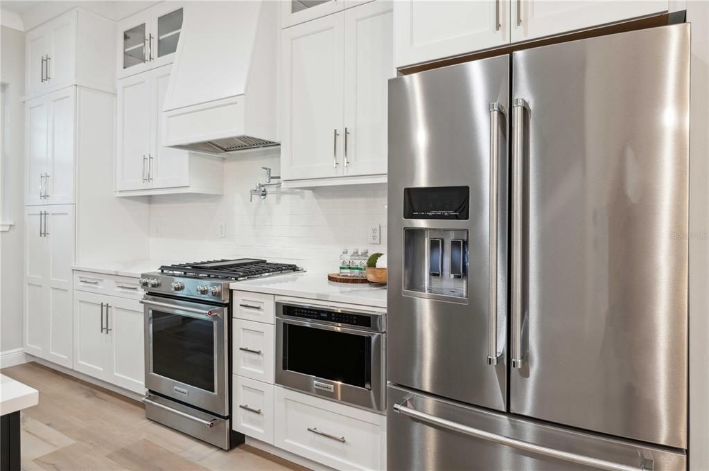 Beautiful Appliances including Microwave Drawer and Decorative Range Hood