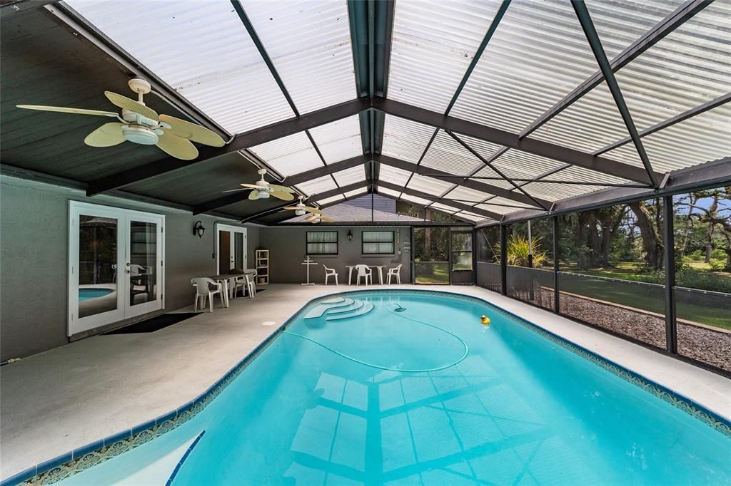 Beautiful heated pool with screen enclosure