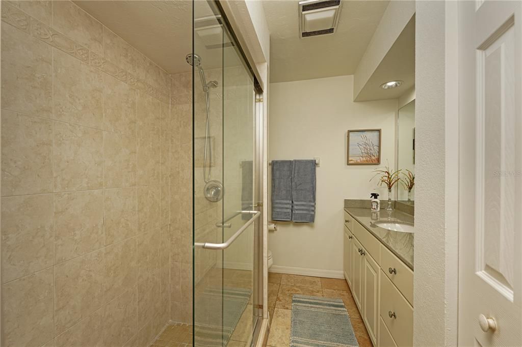 THE PRIMARY BATHROOM SHOWER