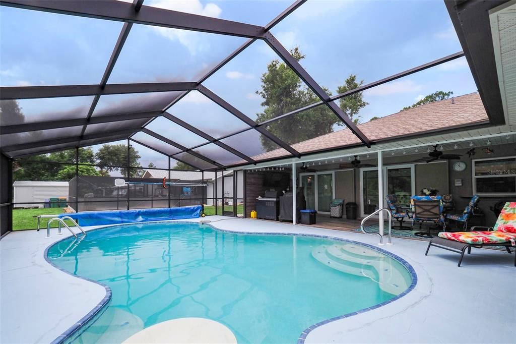 Pool with steps and Solar Cover & Pool Cleaner