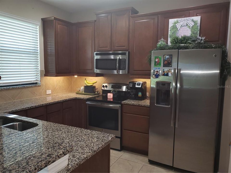 Double stainless steel sink; stainless steel appliances