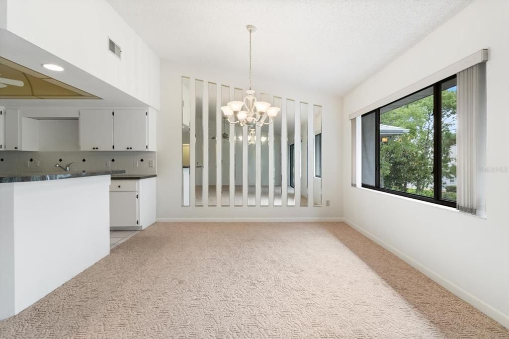 Dining Room w/ Large Sliding Window