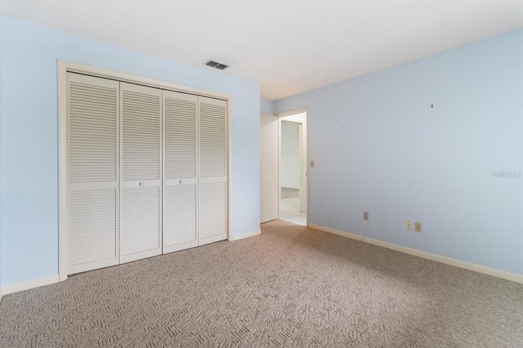 Guest Bedroom w/ Double BiFold Closet