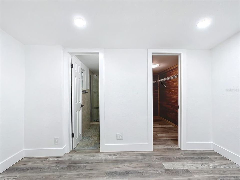 Primary Bedroom (with ensuite bath and walk-in closet)