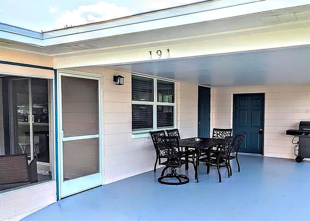 Classic Florida home has terrazzo floors throughout. Two bedrroms and 1 full bathroom. Sturdy block construction painted Florida Salmon-pink, metal roof, carport, screened front porch. Laundry room with washer and dryer.