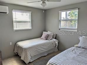 Second bedroom with two twin beds.