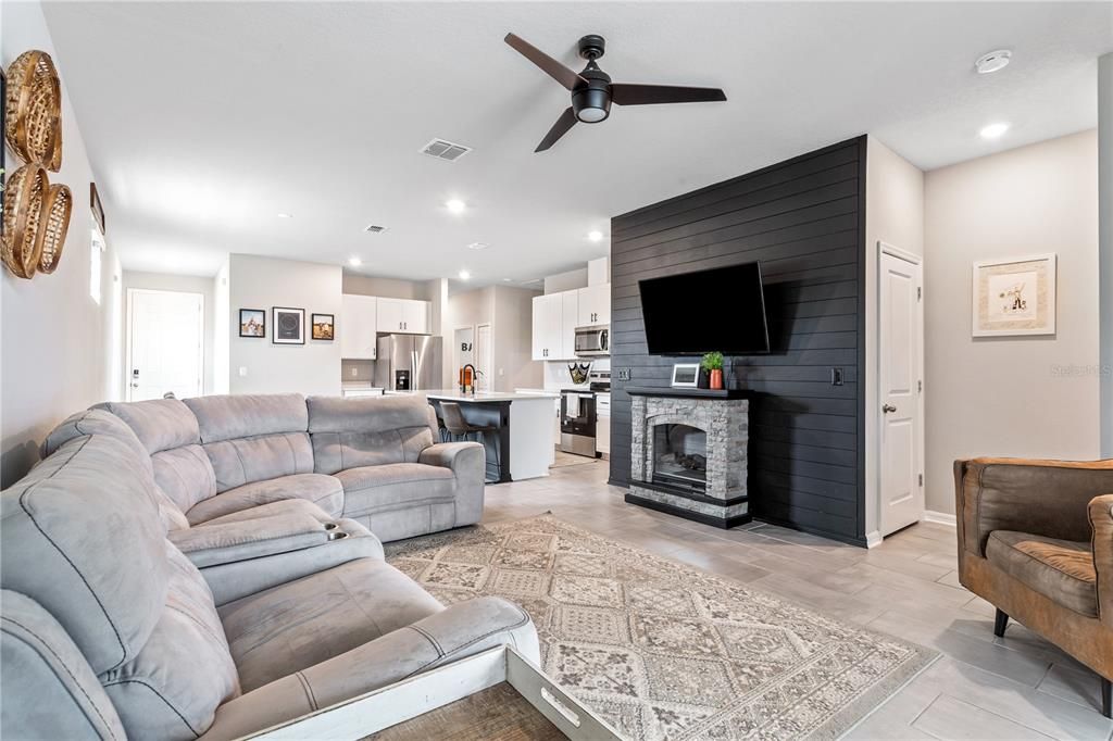 Living room leads to the primary bedroom & lanai.