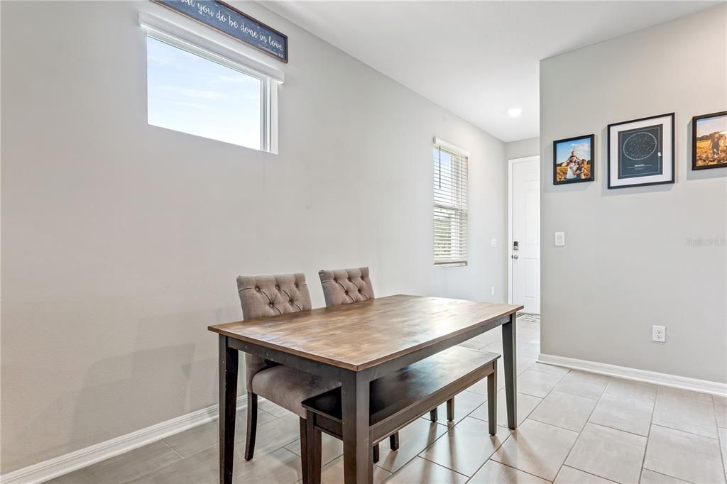 A full dining set can be added to this area for additional dining room.