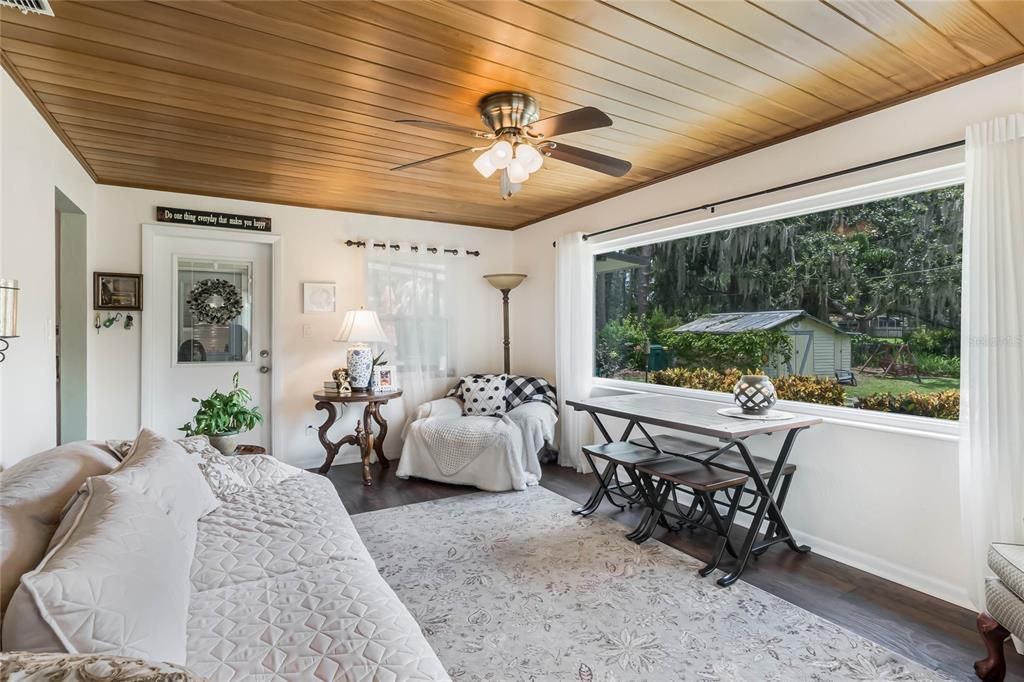 Sunroom, door leading to covered porch