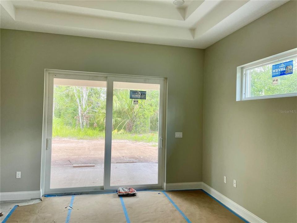 Master bedroom with access to rear lanai.