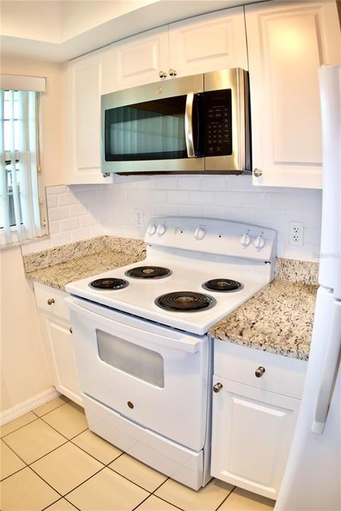 Stove, Microwave and Cabinetry