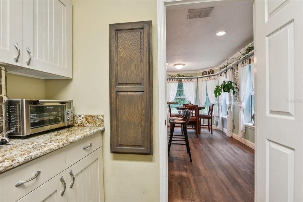 Butler's pantry with laundry hook up & half bath