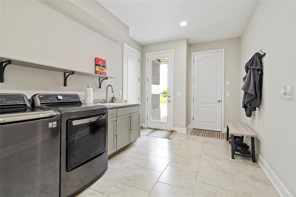 Huge laundry room/drop zone.