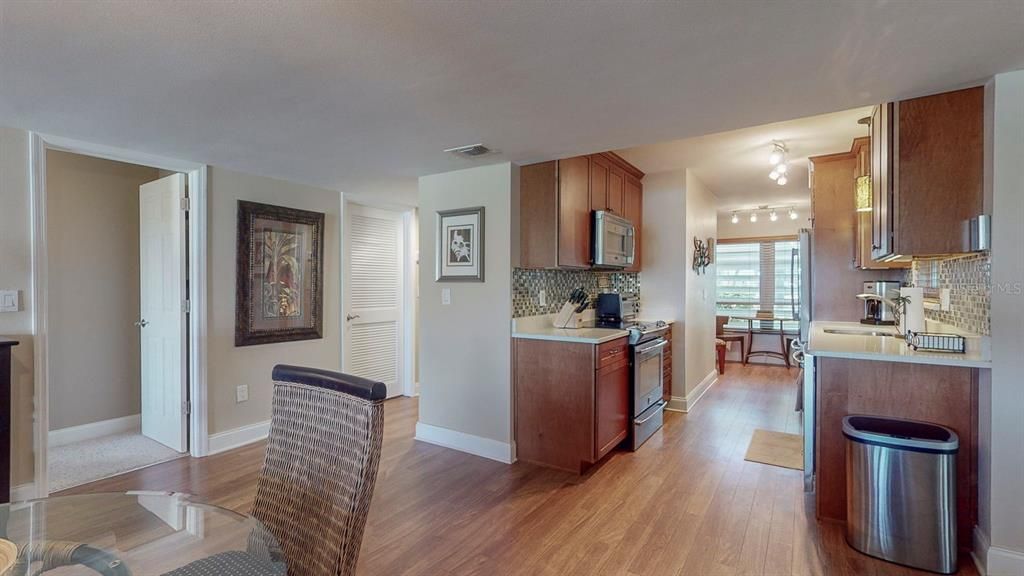 KITCHEN OPENS UP TO LARGE LIVING AREA