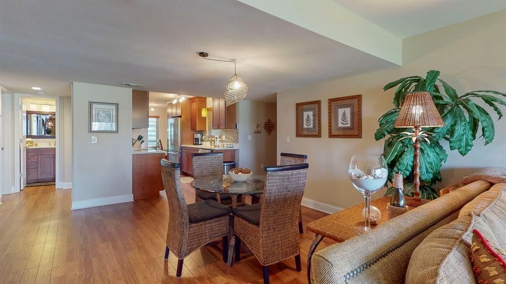 OPEN FLOORPLAN AREA WITH DINING AND LIVING AREAS