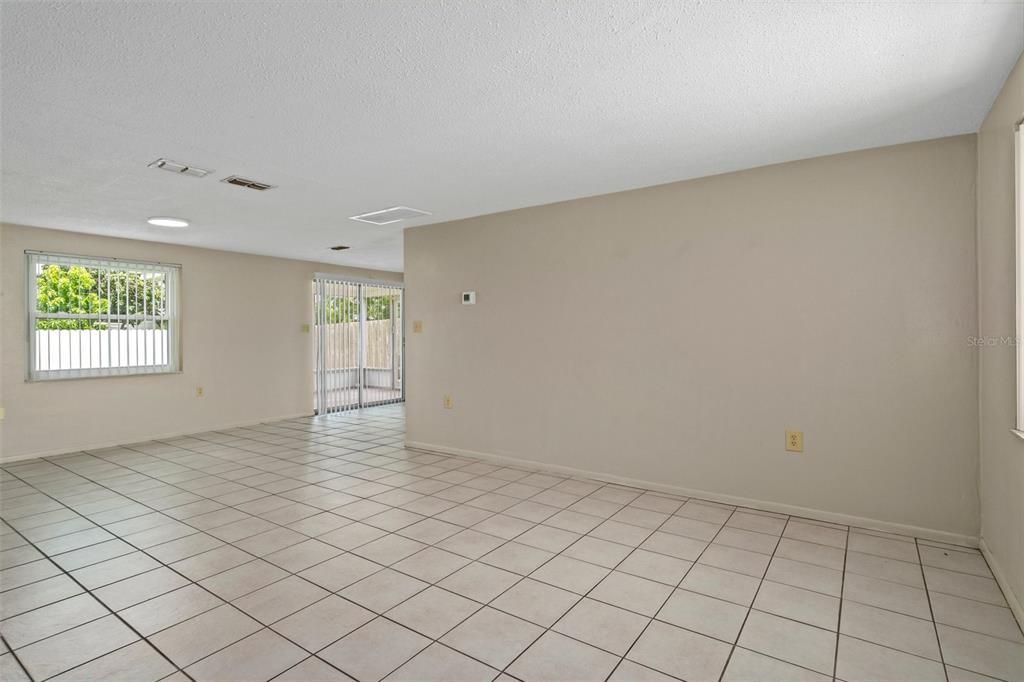 View from front door to living room and dining room