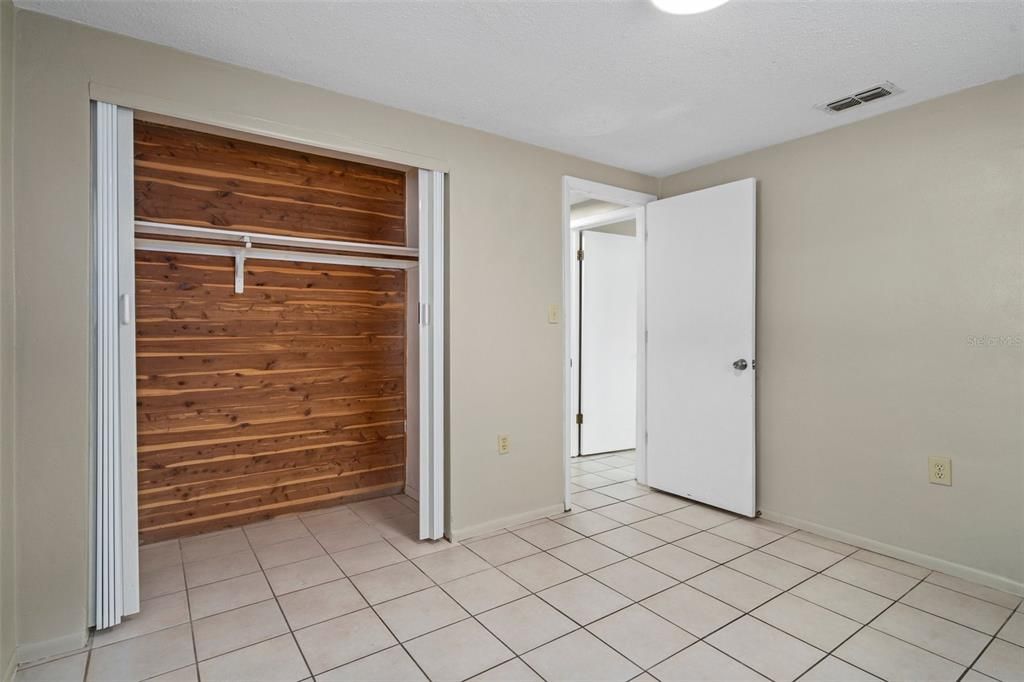 Guest bedroom with cedar lined closet