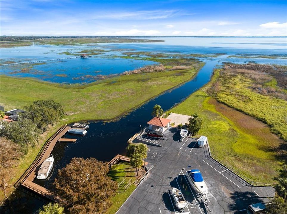 Kissimmee Bay Marina that leads out to East Lake Toho that also connects to Fells Cove and Lake Ajay.