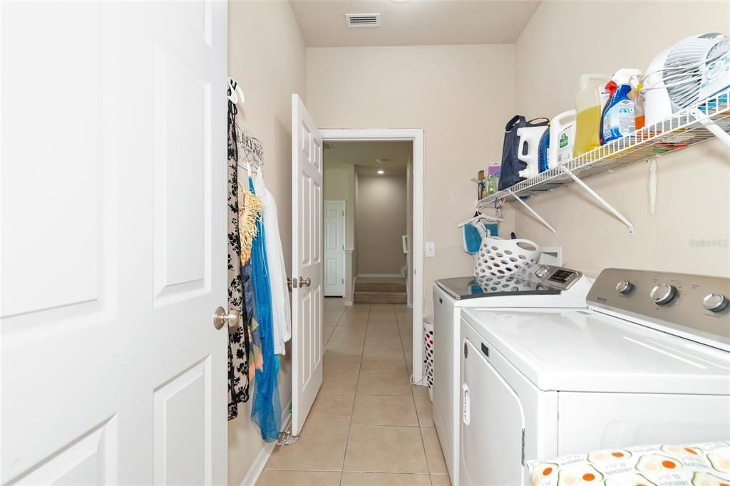 unique pass-through laundry with access to kitchen and bedrooms