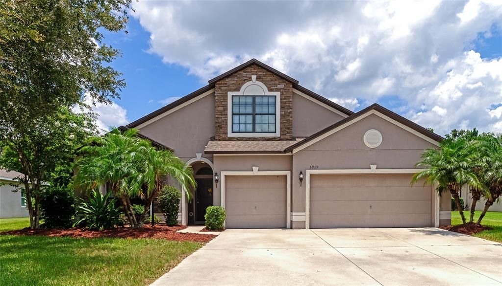 spacious driveway & 3-car garage